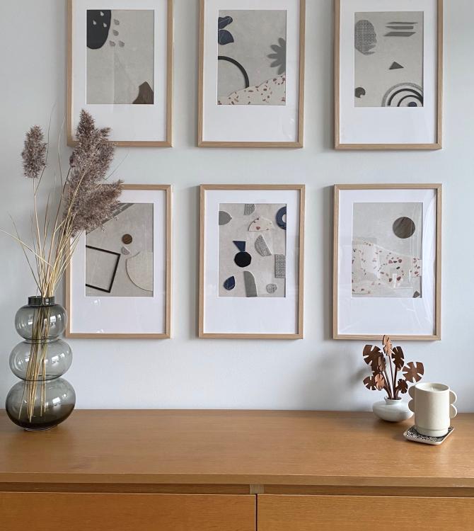 Un mur de cadre arty et épuré Un mur de cadre arty et épuré