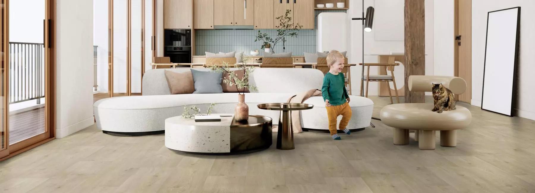 a small child standing in front of o sofa in the living room